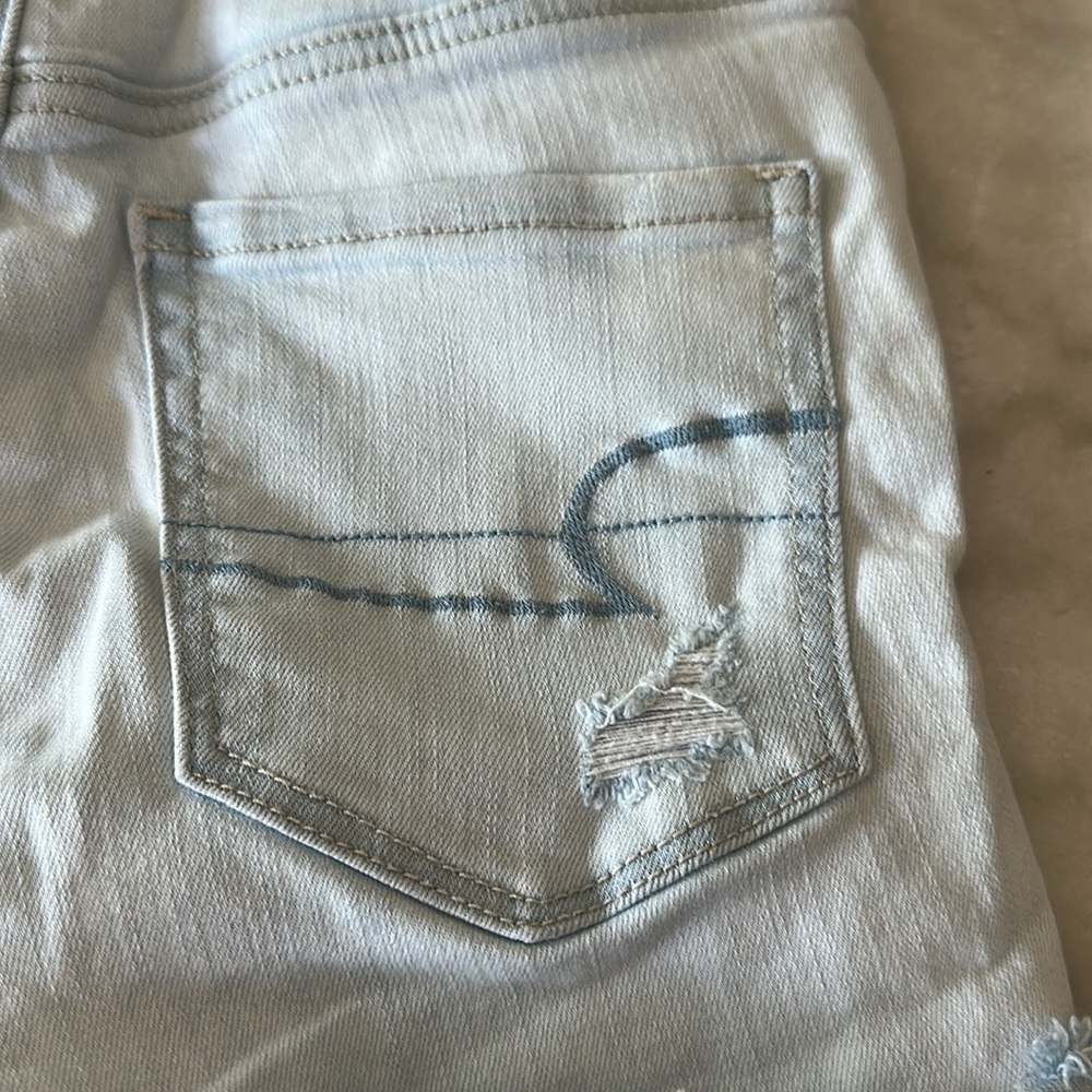 American Eagle Next Level Stretch Hi Rise Shortie Denim Shorts - Picture 9 of 12